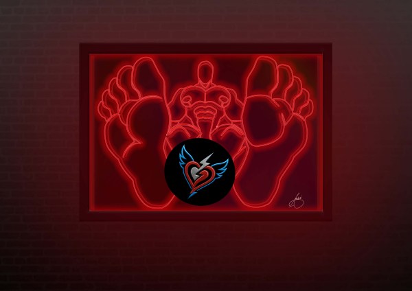 Red neon rope light wall art depicting an erotic male figure framed by oversized feet, mounted on a black frame in a dark interior setting