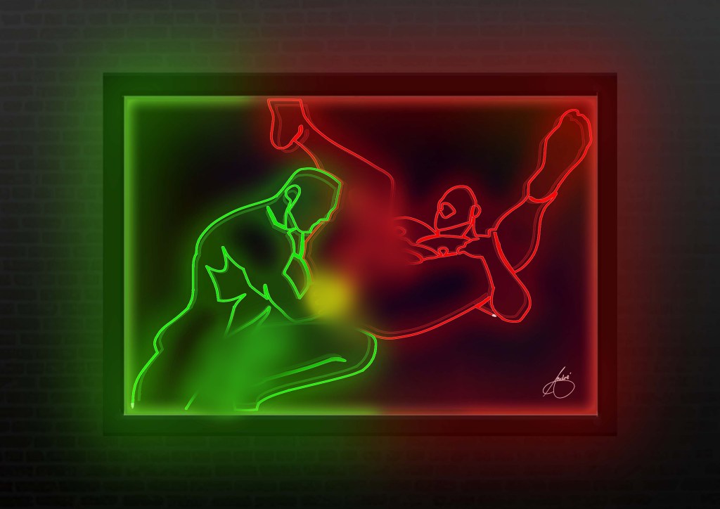 Neon-style erotic line art in a black frame glowing against a dark room. The artwork shows two muscular male figures in an explicit sexual position, outlined in vibrant red and green neon light. The surrounding room is dim, with the neon glow illuminating the wall.