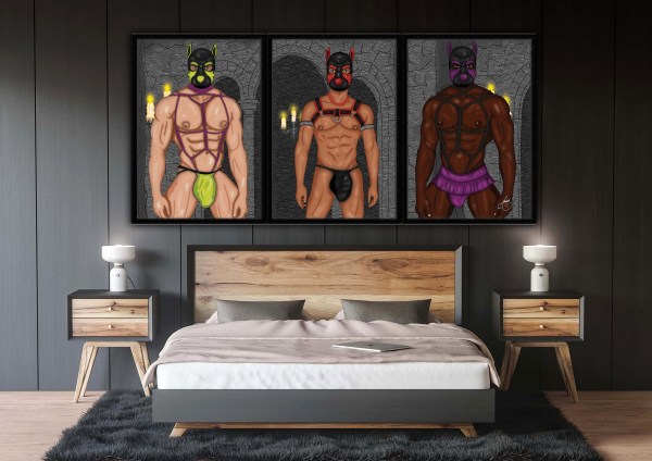 A dark, stylish bedroom with a wooden bed frame and soft neutral bedding. Above the bed hangs a striking triptych artwork featuring three muscular men in colourful pup masks and harnesses — lime and purple, red and black, and violet and black — posed against a grey stone dungeon backdrop lit by flickering candles. The moody lighting and bold art create an erotic, powerful focal point above the bed.