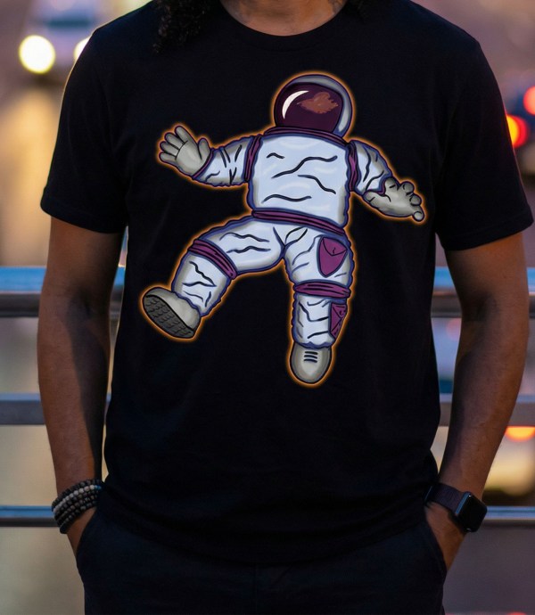 floating astronaut pop art graphic tee space illustration black t-shirt streetwear design