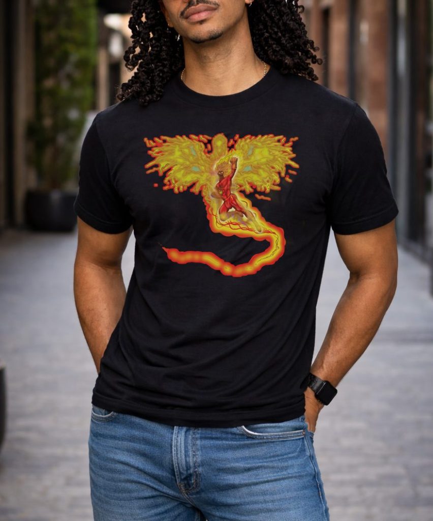 Black apparel featuring glowing phoenix man design with fiery wings, worn by male model in a clean studio setting